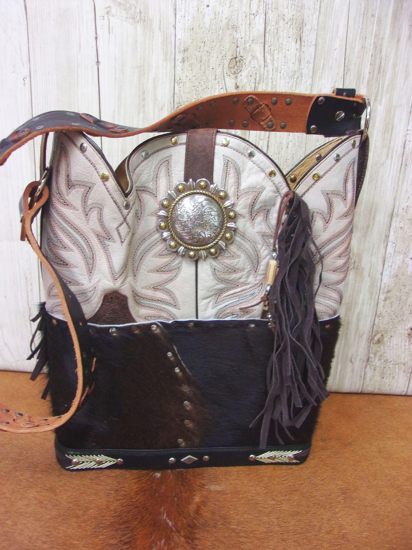 Top Shelf Cowboy Boot Purse with Fringe TS304 handcrafted from cowboy boots. Shop Handbags at ChrisThompsonBags.com and buy the best boot top purse, Country Chic, country fashion, country style, cowboy boot lover, cowboy boot purse, Cowgirl Chic, cowgirl style, luxury handbag, rodeo purse, western chic, western fashion, western style at Chris Thompson Bags.